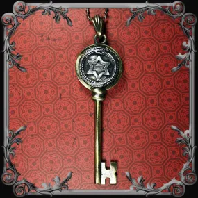 Ouroboros Key Pendant - Antique Brass Finish